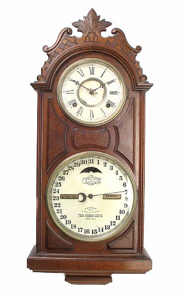 Appraisal: A Victorian walnut calendar clock third quarter th century height