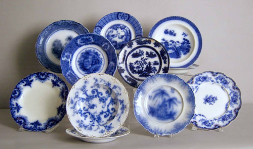 Appraisal: Eleven flow blue plates and soup bowls