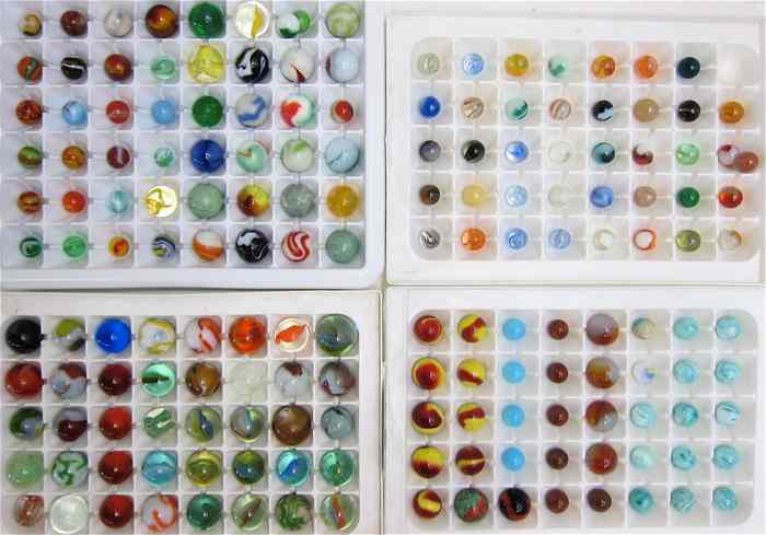 Appraisal: ESTATE COLLECTION FOUR TRAYS OF APPROXIMATELY HAND MADE MARBLES Peltiers