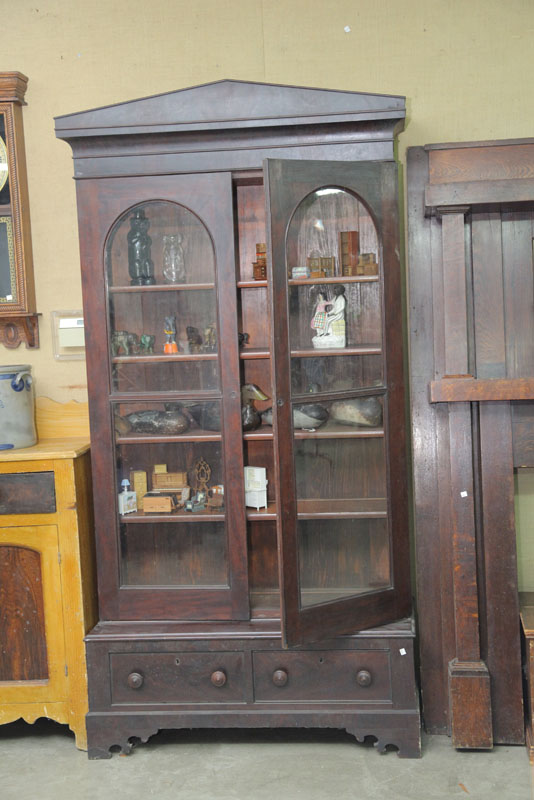 Appraisal: MAHOGANY GLASS FRONT BOOKCASE Having two glazed doors with four