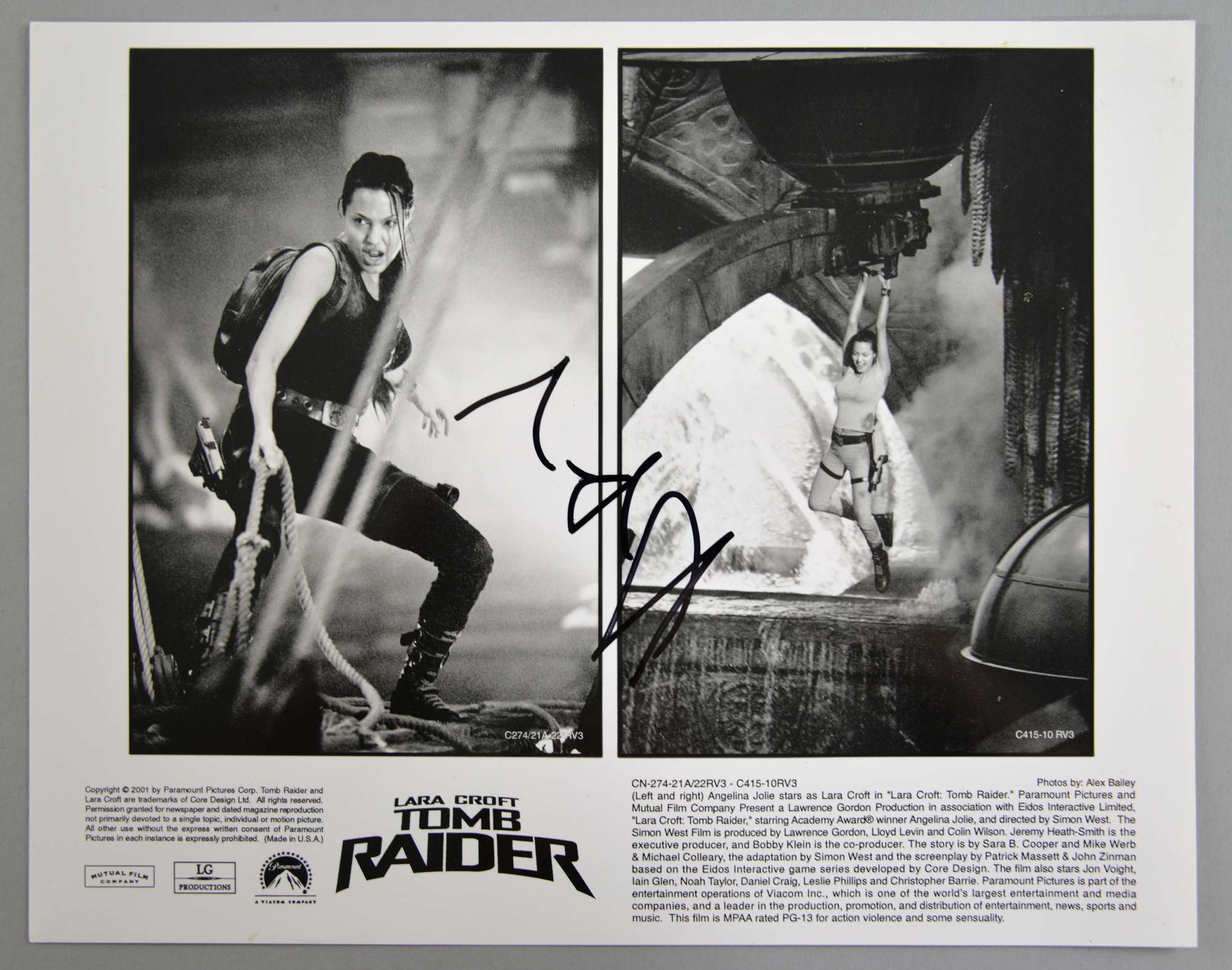 Appraisal: Tomb Raider promotional x photograph signed in black by Angelina