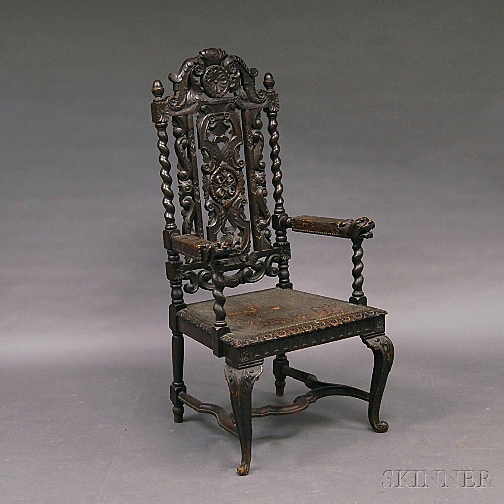 Appraisal: Baroque-style Carved Oak and Leather-upholstered Armchair th century the cresting