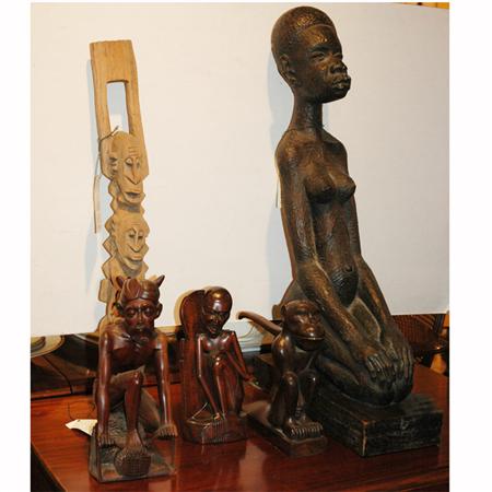 Appraisal: Group of African Carved Wood Figures Estimate -