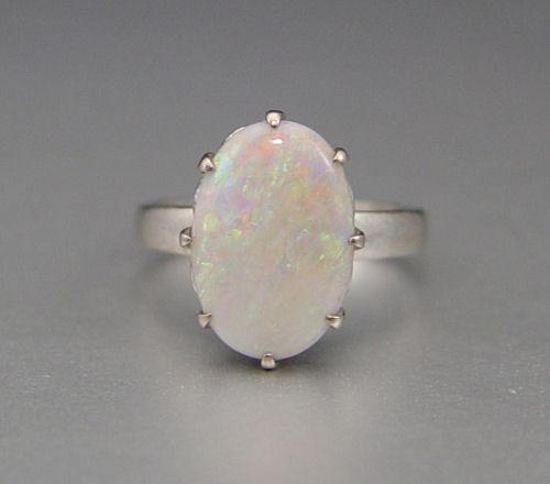 Appraisal: K CT OPAL RING K white gold ring contains one