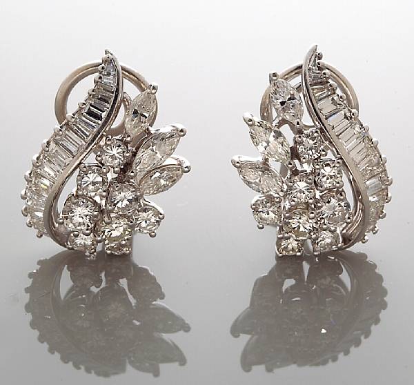 Appraisal: A pair of diamond cluster earrings estimated total diamond weight