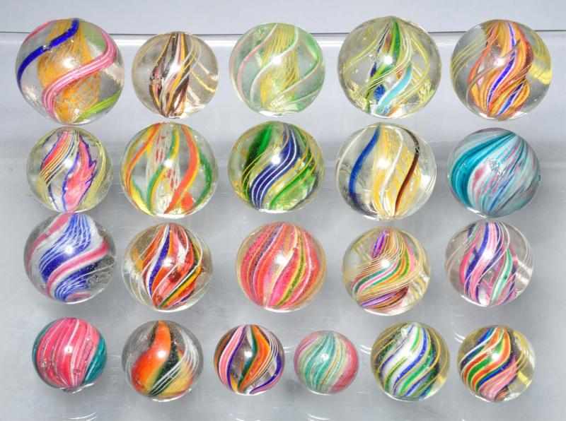 Appraisal: Lot of Assorted Swirl Onionskin Marbles Description Group includes two