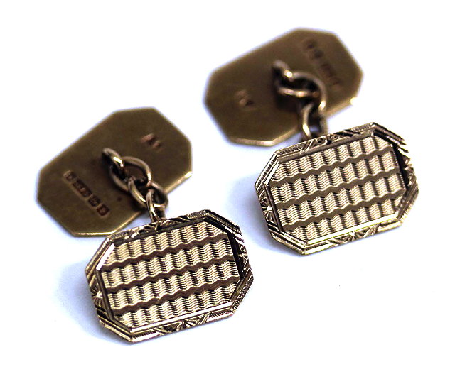 Appraisal: A PAIR OF CARAT GOLD CUFFLINKS of rectangular form with