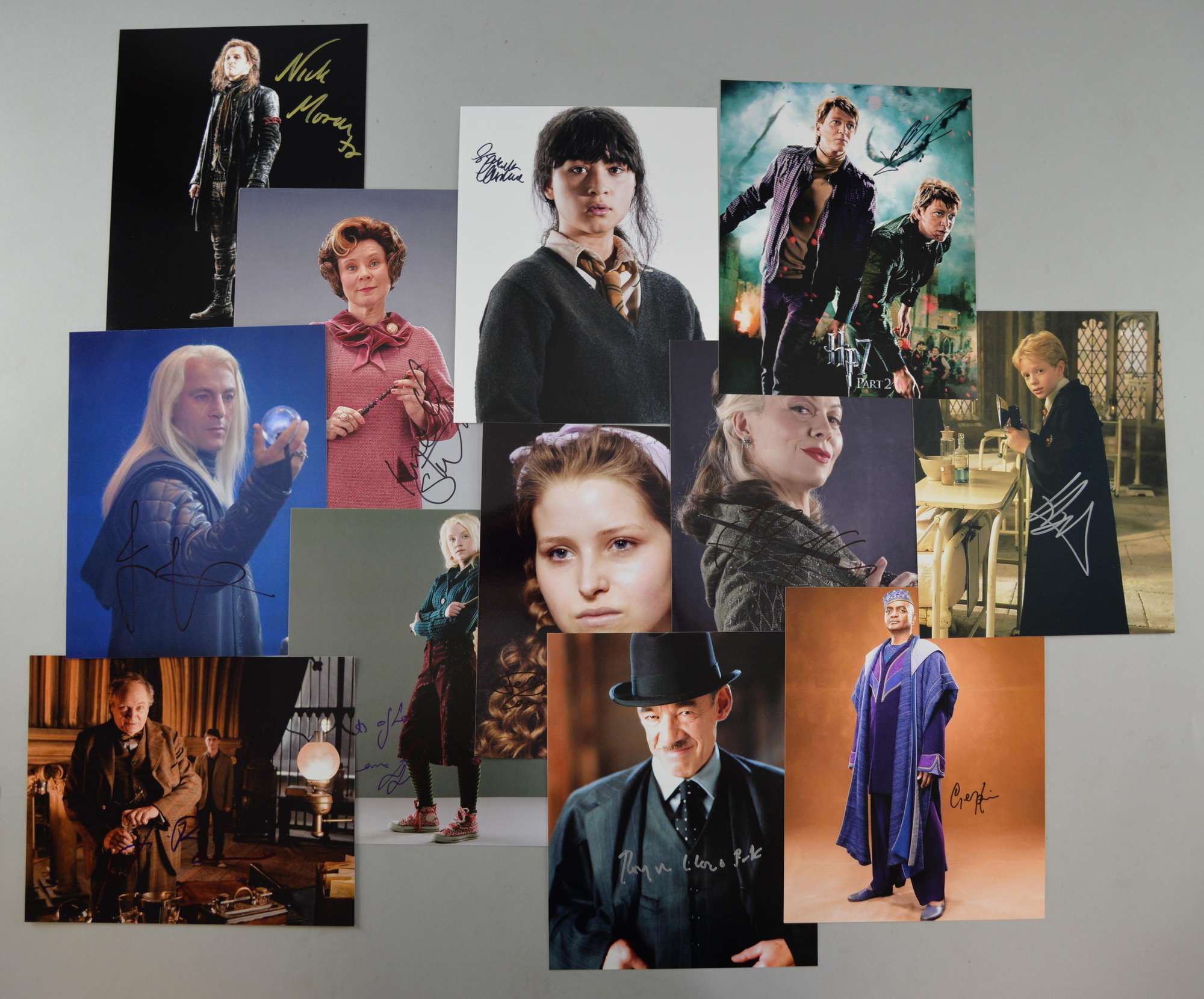 Appraisal: Harry Potter Fourteen signed photographs posters by Jason Isaacs Imelda