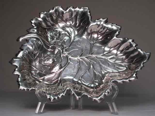 Appraisal: Footed sterling silver strawberry leaf dish Stamped ''Sterling'' Good condition