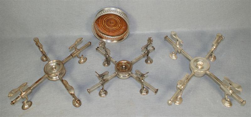 Appraisal: plated silver dish crosses with a plated silver bottle stand