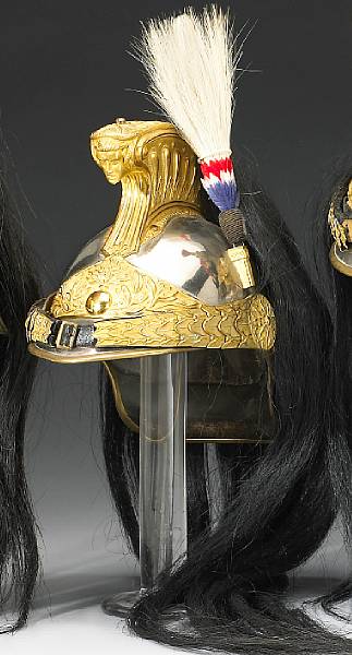 Appraisal: A French Model dragoon officer's helmet The nickeled skull with