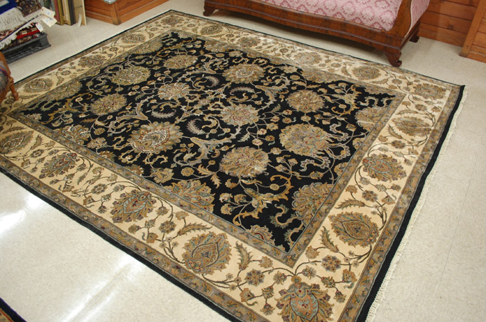 Appraisal: FINE HAND KNOTTED ORIENTAL CARPET Indo-Persian overall floral design on