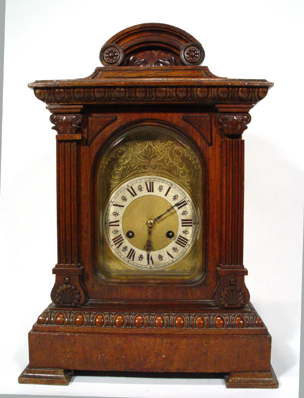 Appraisal: Edwardian Mahogany cased mantle clock with chased brass dial flanked