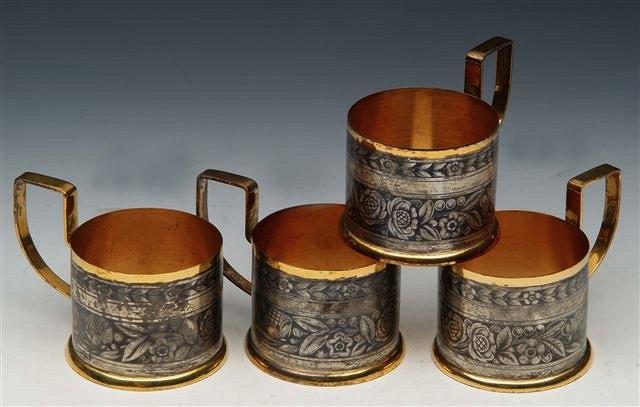 Appraisal: A SET OF FOUR RUSSIAN SILVER GILT AND NIELLO GLASS