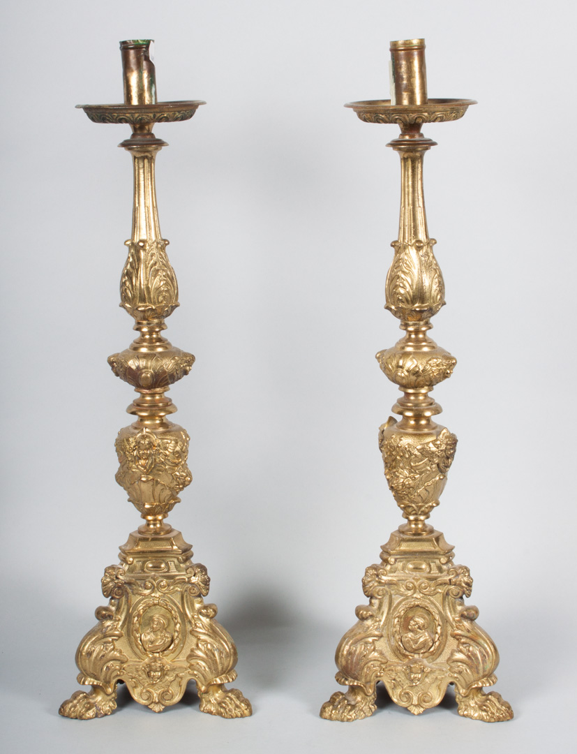 Appraisal: Pr of ecclesiastical cast brass altar candlesticks second half- th