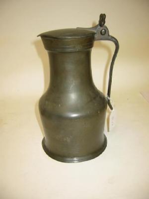 Appraisal: A NORMANDY PEWTER FLAGON th century of shouldered cylindrical form