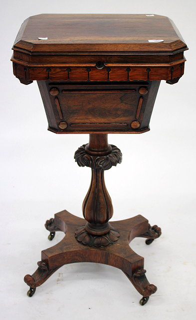 Appraisal: A VICTORIAN ROSEWOOD WORKTABLE the top opening to reveal an