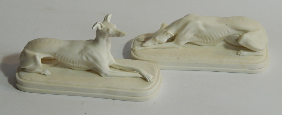 Appraisal: A pair of thC Parian models of recumbent greyhounds the