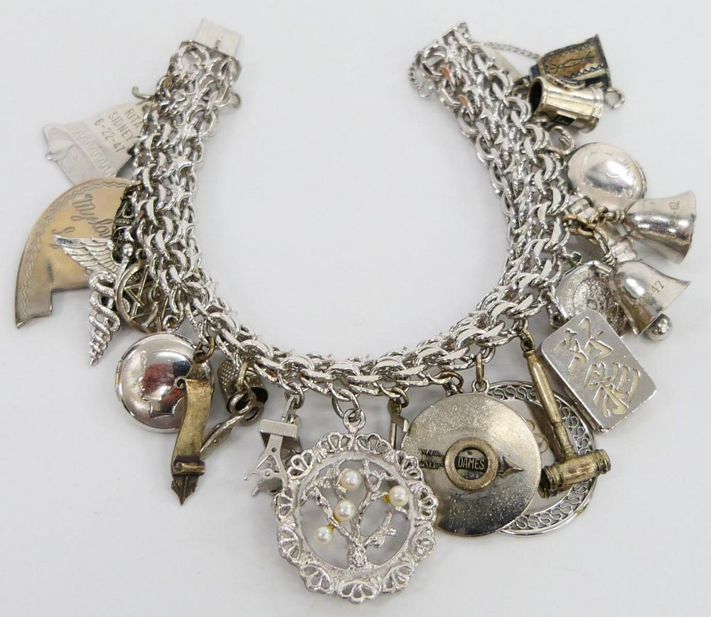 Appraisal: HEAVY STERLING SILVER DOUBLE CHAIN CHARM BRACELET A heavy sterling