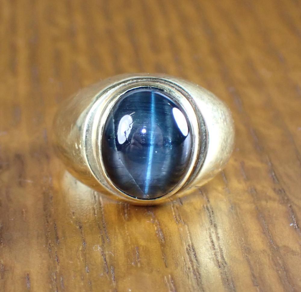 Appraisal: MAN'S CAT'S EYE AND EIGHTEEN KARAT GOLD RING bezel set