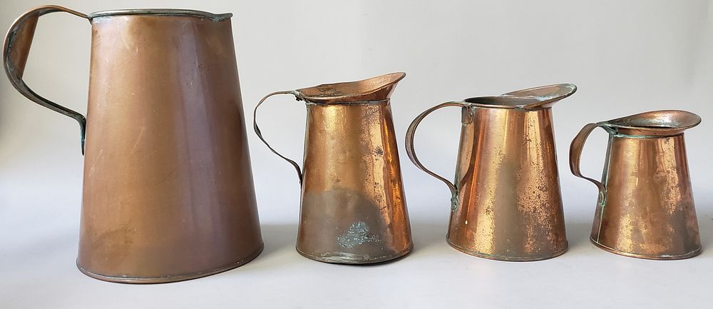 Appraisal: Set of Antique Copper Graduated Pitchers Set of Antique Copper