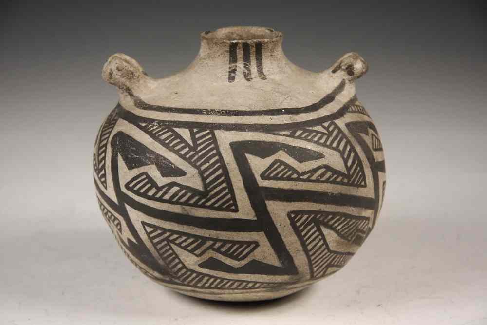 Appraisal: NATIVE AMERICAN POTTERY - Anasazi Black and White Canteen circa