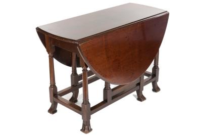 Appraisal: An early th Century mahogany gateleg table the oval top