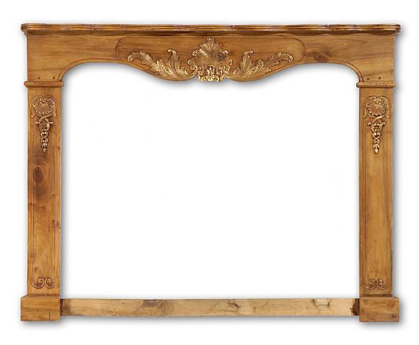 Appraisal: A Louis XV style walnut fireplace surround height in width