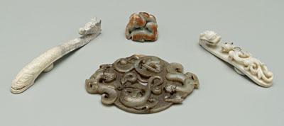 Appraisal: Four Chinese hardstone carvings belt hook white with grey vein