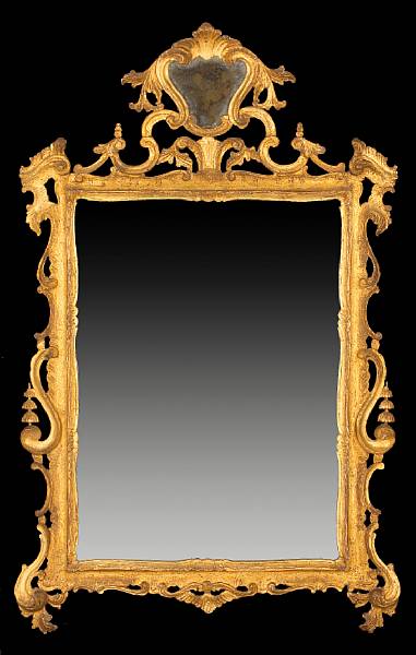 Appraisal: An Italian Rococo style giltwood mirror th century height ft