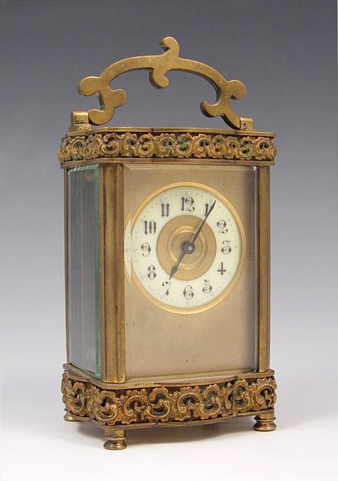 Appraisal: ORNATE FRENCH BRASS CARRIAGE CLOCK Ornate brass case beveled glass