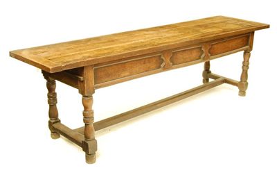 Appraisal: An th century French cherrywood and chestnut farmouse table the