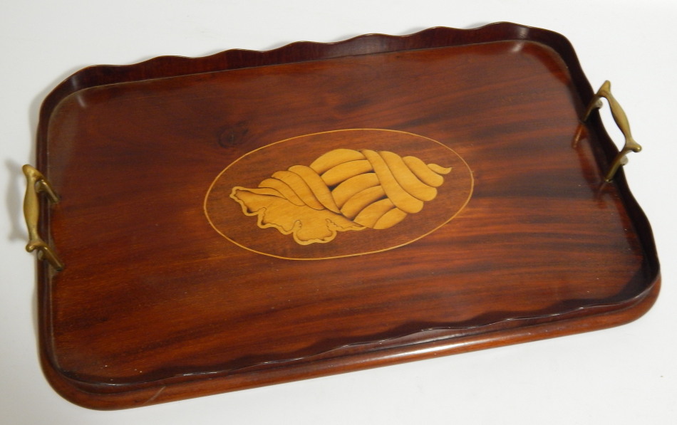 Appraisal: A thC mahogany rectangular tray with shell inlay cm x