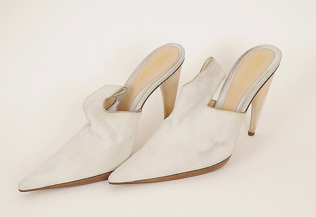 Appraisal: A pair of Alexander McQueen high heeled cream suede mules