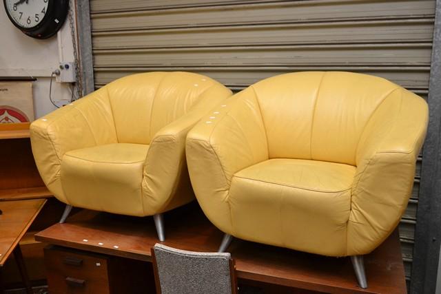 Appraisal: A PAIR OF YELLOW LEATHER TUB CHAIRS