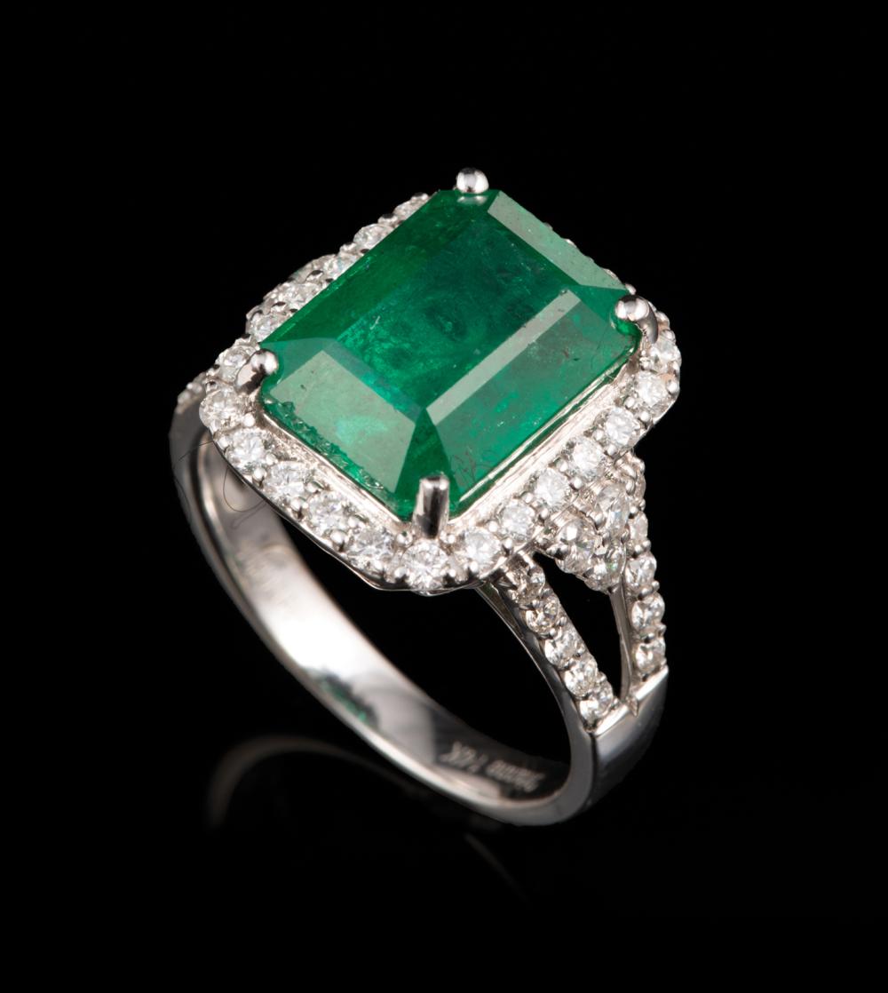 Appraisal: kt White Gold Emerald and Diamond Ring center rectangular cut