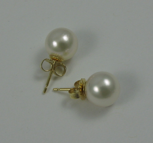 Appraisal: PAIR OF PEARL AND K GOLD EAR STUDS each set