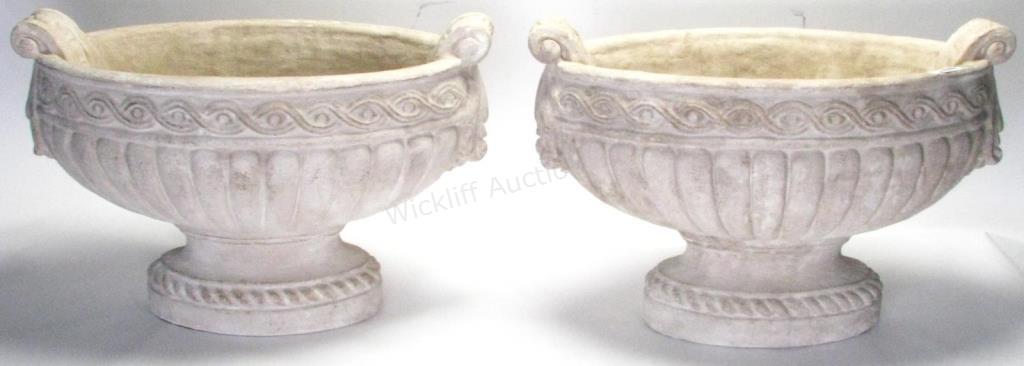 Appraisal: A pair of classic style cast composition urns faux concrete