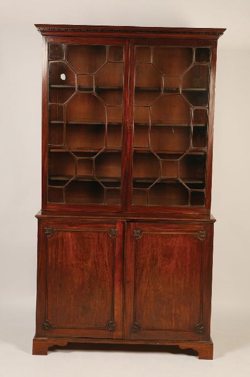 Appraisal: A GEORGE III MAHOGANY LIBRARY BOOKCASE the upper section with