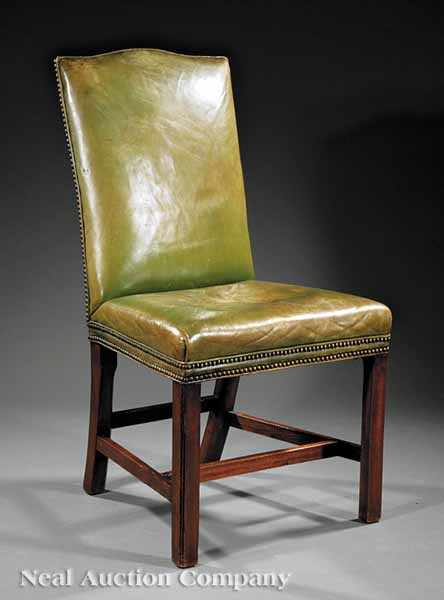 Appraisal: A George III-Style Mahogany and Green Leather Backstool serpentine crest