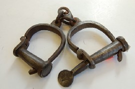 Appraisal: PAIR TH CENTURY HANDCUFFS