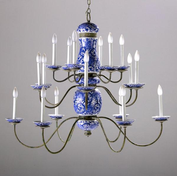 Appraisal: Porcelain and wrought iron chandelier th C Eighteen-arm three tiers