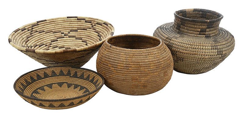 Appraisal: Four Southwestern Coiled Baskets th century storage jar in conical