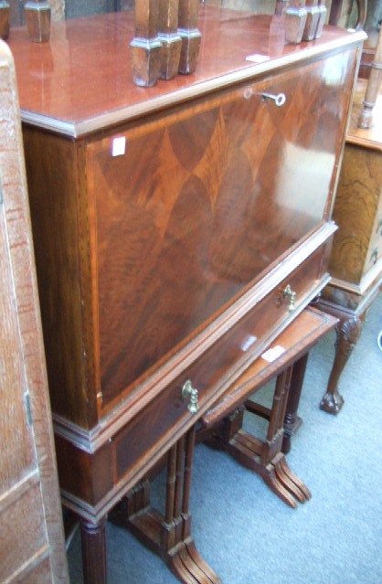 Appraisal: A th century mahogany and satinwood writing cabinet with fall