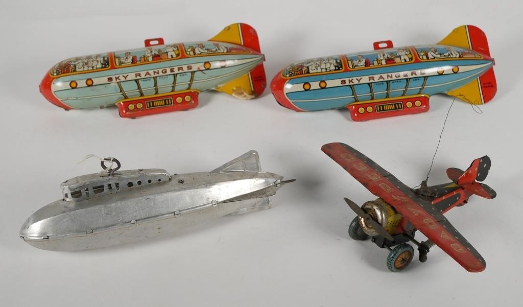 Appraisal: EARLY AIR MILITARY TOYSTwo tin lithograph Zeppelin toys Sky Rangers