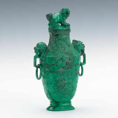 Appraisal: A Carved Malachite Lidded Vase Flattened vase shape carved in