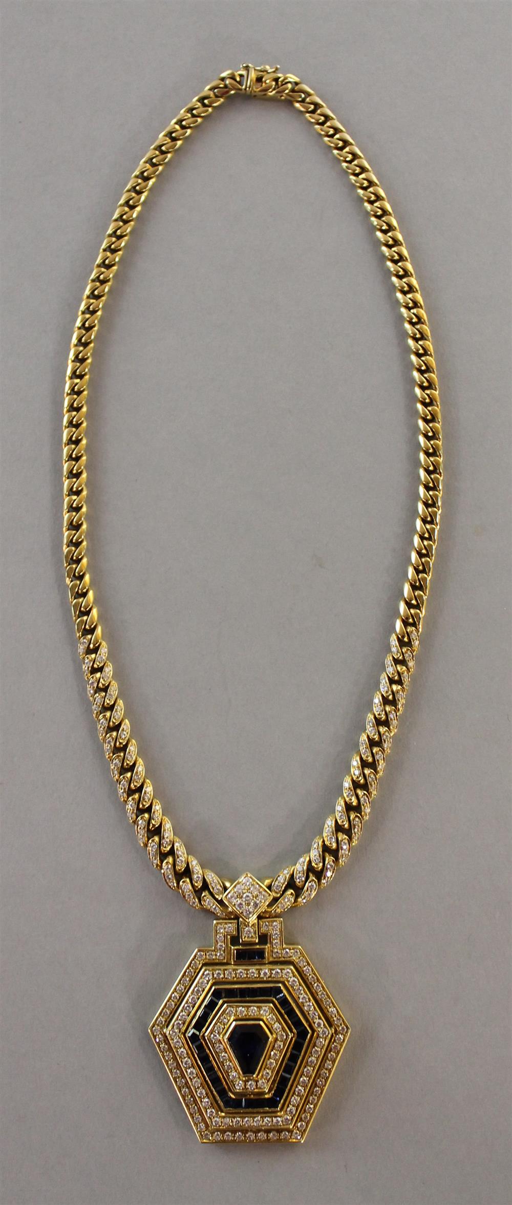 Appraisal: LADY'S K YELLOW GOLD DIAMOND AND SAPPHIRE NECKLACE centered by