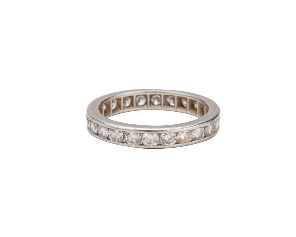 Appraisal: Platinum and Diamond Band channel-set with round brilliant-cut diamonds approx