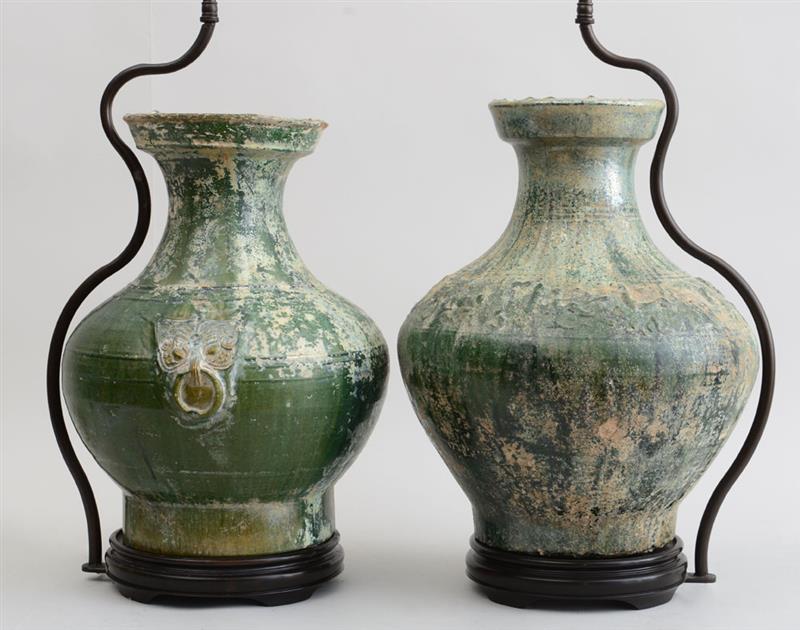 Appraisal: TWO SIMILAR HAN IRIDESCENT GREEN GLAZED POTTERY JARS MOUNTED ON