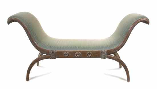 Appraisal: A Neoclassical Style Curule Form Window Bench having upholstered arms